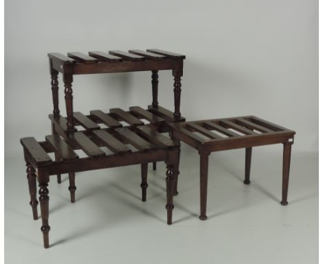 Three similar antique turned mahogany Trunk Rests, and a smaller oak ditto. (4)