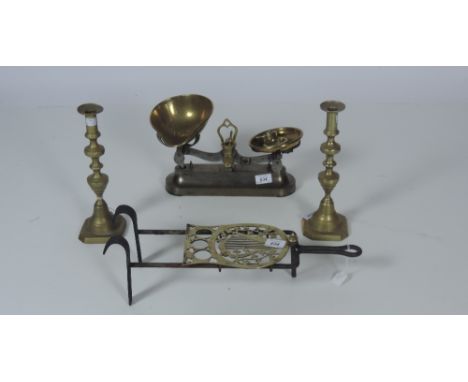 An unusual 19th Century Irish brass and steel Trivet, the brass pot stand with pierced decoration of large Harp surrounded by