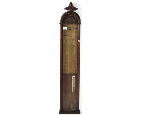 A Victorian carved oak cased Admiral Fitzroy Barometer, 117cms (46") high. (1)

Provenance: Ardfort House, Thurles, Co. Tippe