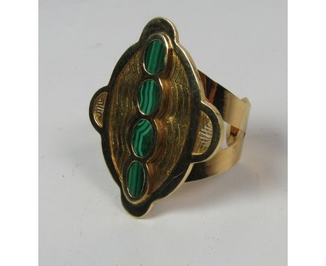 An unusual and extremely fine heavy 18ct gold Swiss designed Gubelin Brooch, with four inset malachite stones, and with match
