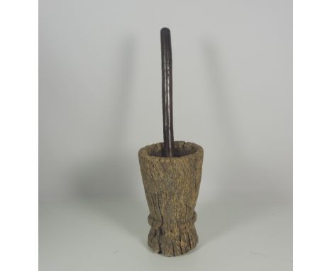 Taxidermy: An unusual 19th Century African carved wooden Meal Bowl & Grinder Stick. (2)