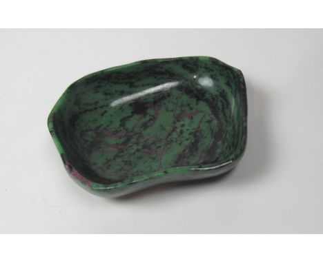 A rare large Zoisite (Tanzanite) Bowl, with ruby streaks, 24cms (9 1/2") long. (1)