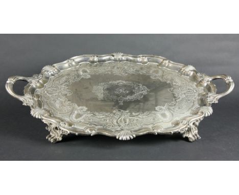 An important and very heavy silver plated two handled oval Tray, of large proportions, the stepped rim with shell decoration 