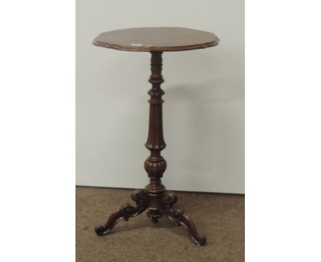 An attractive Victorian carved walnut Occasional Table, with shaped top, on tripod base, (1)