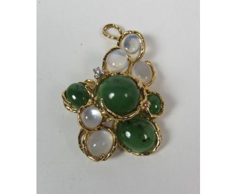 A large Julia Plana Design 18ct gold Brooch, (approx. 51.4g), mounted with three small diamonds, five moonstones and four gre