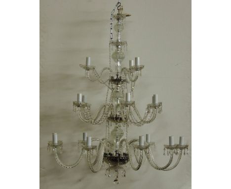 An impressive large modern 15 light Chandelier, with cutglass chain drops and scroll arms, approx. 177cms (46") high. (1)