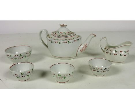 An unusual early 19th Century English porcelain part Tea Set, decorated with acorns, green leaves etc., consisting of teapot 