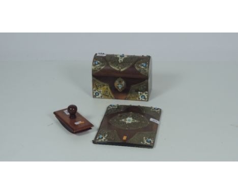 A Victorian casket shaped walnut Stationary Box, and Blotter en suite with engraved and pierced brass mounts, and decorated w