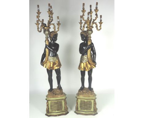 A good pair of antique style large painted Blackamoor six light Figural Candelabra, on attractive decorated bases, approx. 19