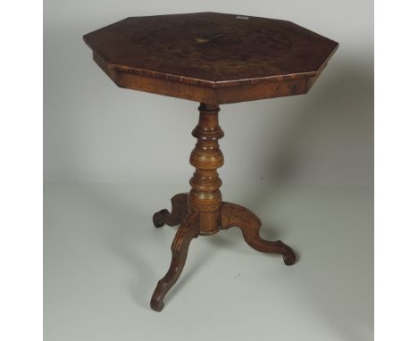 An unusual octagonal Occasional Specimen Table, on a turned pillar support with a tripod base, approx. 65cms (21 1/2") diamet