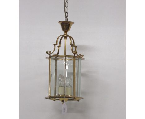 An attractive small brass cylindrical Hall Lantern, approx. 53cms (21") high. (1)