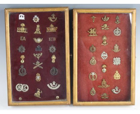 A collection of mostly collar badges to include Queen's Royal Lancers, Tank Regiment, Royal Artillery, Royal Army Ordnance Co
