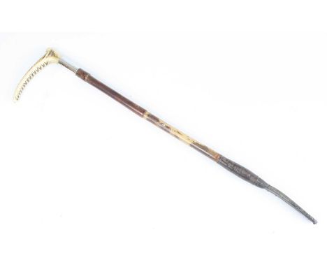 A George V riding crop, having a leather tip and bamboo shaft with silver collar and stag antler handle, the collar marked CC