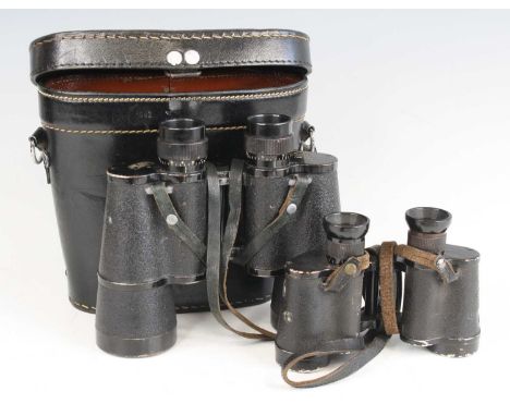 A pair of WW II period binoculars, the left turret marked Carl Zeiss Jena, the right Dienstglas 10 x 50 2158296 H/6400, house