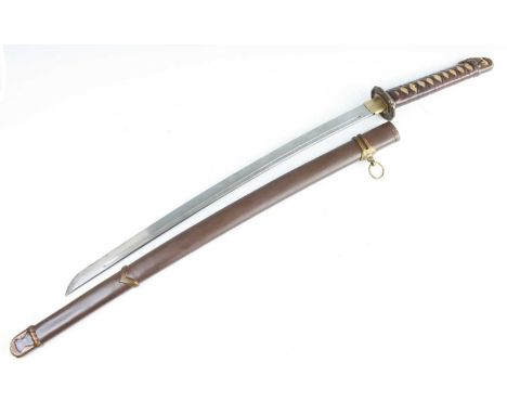 A Japanese Shinto katana, having a 64cm curved fullered blade with brass habaki, pierced tsuba and leather wrapped fish skin 