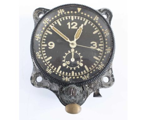 A Junghans Luftwaffe navigator's cockpit clock from a BF109 Messerschmitt, the black dial with quarter Arabic numerals, minut