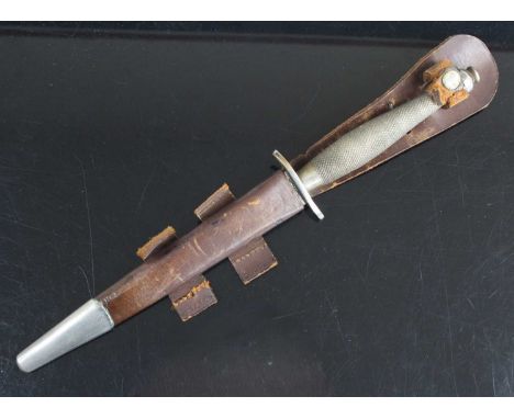 A Fairbairn-Sykes 1st Pattern Commando fighting knife, the 17cm double edged spear-point blade marked to the ricasso The F-S 
