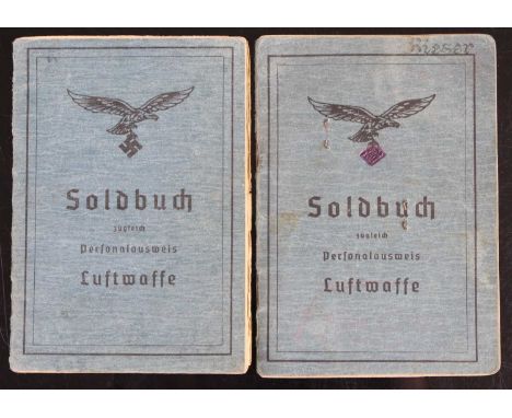 A German Third Reich Luftwaffe Soldbuch, naming Hermann Rieser, with uniform photograph, together with one other example name