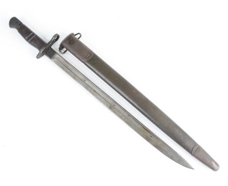 A Remington M1917 bayonet, the 43cm single edged fullered blade marked to the ricasso 1917 Remington with an eagle and flamin