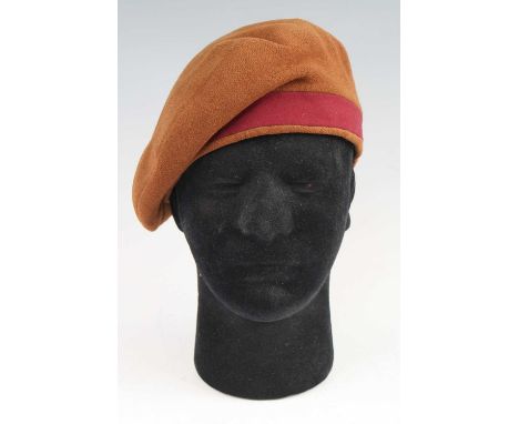 A British Army beret to the 11th Hussars, in brown fabric with cherry coloured band, the quilted interior with leather sweat 