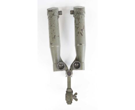 A pair of German Third Reich rabbit ear binoculars, having green painted tubular arms with adjustable lenses and fittings, st