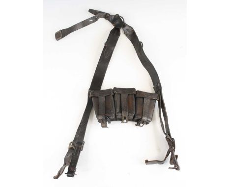 A German Third Reich Y-strap, in black leather with metal fittings, together with a K98 triple ammunition pouch, in pebbled l