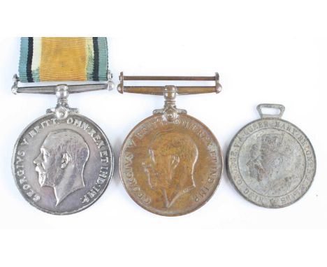 A WW I British War and Mercantile Marine War pair of medals naming ENG. LT. W. HOWELL. R.N.R. and WALTER HOWELL, together wit