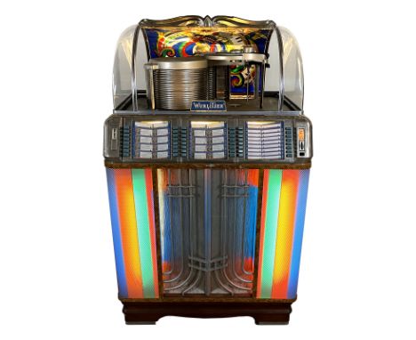 1951-1952 Wurlitzer 1400 Jukebox. 48 selection jukebox playing 33, 45 and 78 RPM records. It comes with 3 records. The jukebo