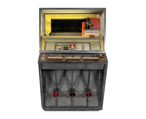 1957 Seeburg KD200 Jukebox. 200 selection jukebox playing 45 RPM records. It comes with 52 records. The jukebox appears to be