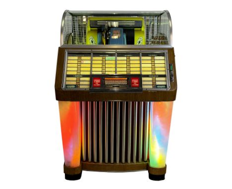 1952 Seeburg M100C Jukebox. 100 selection jukebox playing 45 RPM records. It comes with 50 records. The jukebox appears to be