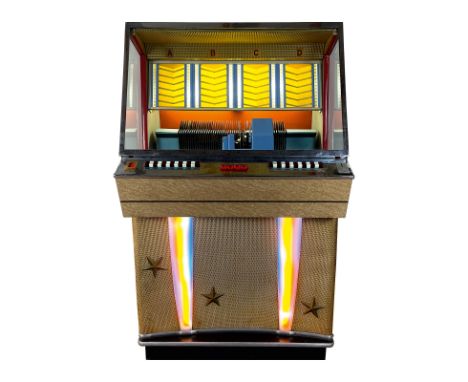 1959 Jupiter 104 Mono Jukebox. 104 selection jukebox playing 45 RPM records. It comes with 51 records. The jukebox appears to