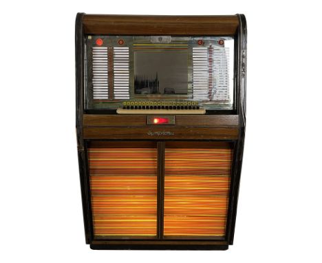 1955-1956 Bergmann Symphonie D80 Jukebox. 80 selection jukebox playing 45 RPM records. It comes with 40 records. The jukebox 