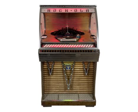 1956 Rock-Ola 1454 Jukebox. 120 selection jukebox playing 45 RPM records. It comes with 60 records. The jukebox appears to be