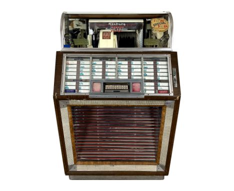 1951 Seeburg M100B Jukebox. 100 selection jukebox playing 45 RPM records. It comes with 50 records. The jukebox appears to be