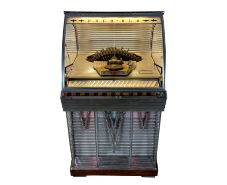 1955 Rock-Ola 1448 Jukebox. 120 selection jukebox playing 45 RPM records. It comes with 60 records. The jukebox appears to be