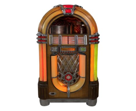 1946-1947 Wurlitzer 1015 "The Bubbler" Jukebox. 24 selection jukebox playing 78 RPM records. It comes with 6 records. The juk