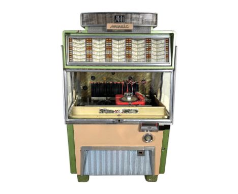 1955 AMI G-120 Jukebox. 120 selection jukebox playing 45 RPM records. It comes with 60 records. Overall fair original visual 