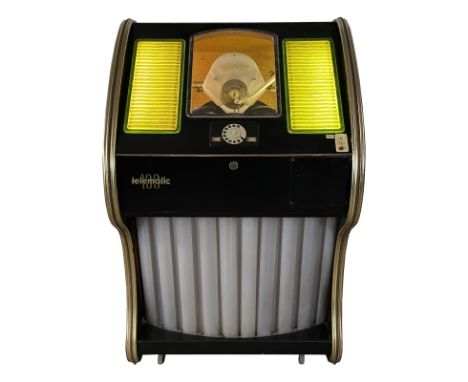 1955 Tonomat Telematic 100 Jukebox. 100 selection jukebox playing 45 RPM records. It comes with 20 records. The jukebox appea