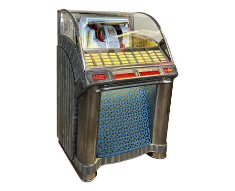 1953 Seeburg HF100G Jukebox. 100 selection jukebox playing 45 RPM records. It comes with 50 records. The jukebox appears to b