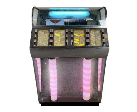 1957 Electro-Kicker Jupiter 100 Jukebox. 100 selection jukebox playing 45 RPM records. It comes with 50 records. The jukebox 