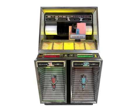 1959 Seeburg 220 "Channel" Jukebox. 100 selection jukebox playing 45 RPM records. It comes with 44 records. The jukebox is al