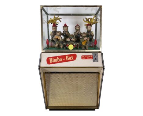 Bimbo-Box coin-operated Monkey Band. Currently in a not playing condition. The machine isn't fully complete, it's missing a t