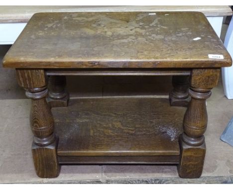 A rectangular oak 2-tier lamp table, on baluster legs, W61cm 