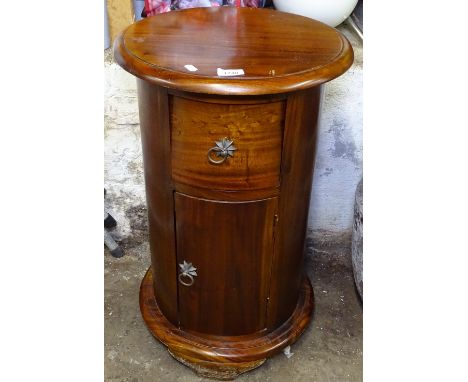A hardwood barrel-design bedside cupboard/lamp table, with drawer 