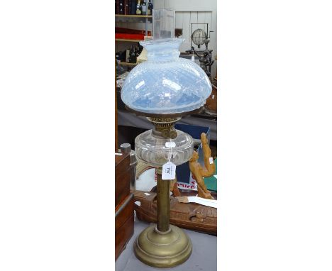 A Victorian brass oil lamp with Vaseline glass shade 