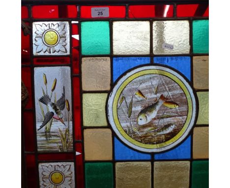 A Victorian brass and stained glass firescreen, with inset leadlight panels depicting birds and fish, height 68cm overall 