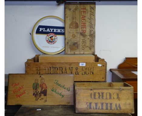 A collection of Vintage wine crates, lids, and a Player's tray 