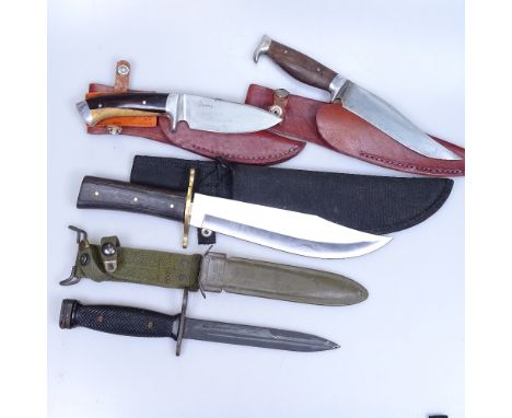 A US Army knife, an African knife etc 
