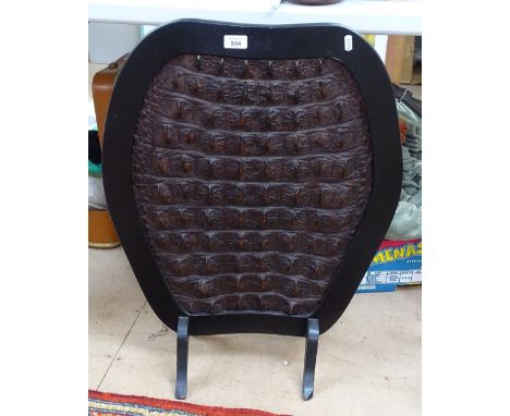 Crocodile skin firescreen with ebonised frame 