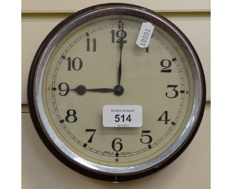 A Vintage Bakelite wall clock with chrome bezel, diameter 17cm 